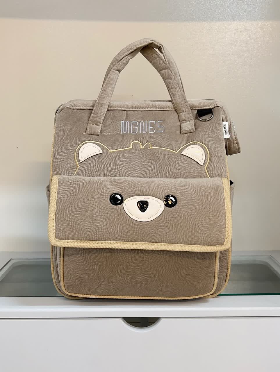 photo_۲۰۲۵-۱۰-۱۰_۱۲-۴۵-۲۱ ساک کوله ای خرسی مگنس کرم - Image 1